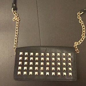 Crossbody gold and black studded clutch